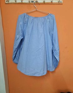 Blue Top with White Frill Detailing