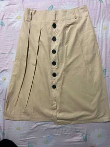 It Is a Cute Brown Skirt With Buttons