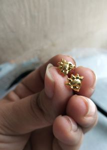 Peacock earrings one garam