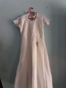 Beautiful White Coloured Gown. Festive Type.