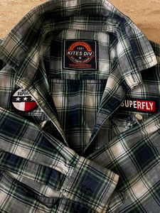 Boy&#39;s Plaid Button-Down Shirt With Jeans