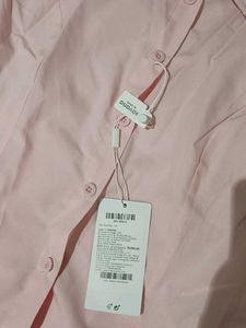 Trendy Pink Lace Up Shirt