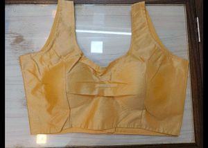 Gold Sleeveless Blouse