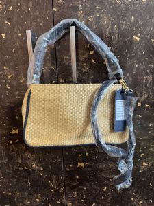 new Tommy Hilfiger Handbag ( has flaw)