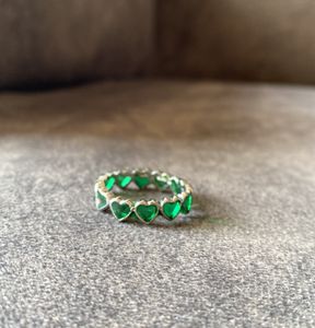 Emerald Green Hearts finger ring.