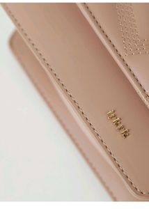 Iykyk Asymmetric Stich Textured Sling Bag