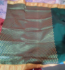 Selling A Beautiful Green Banarsi Saree