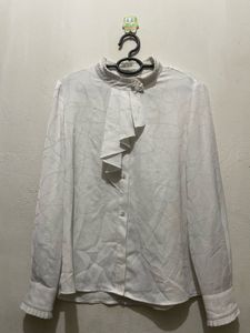 Elegant White Ruffled Blouse