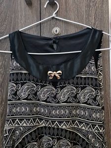 A Black Top With Up Down