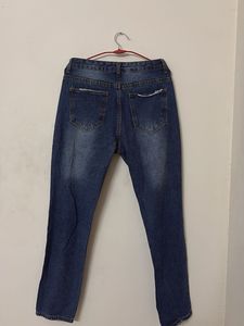 Ripped Blue Denim Jeans