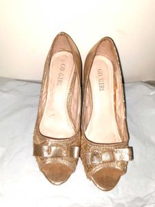 Go Girl Gold Bow Heels