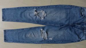 Ripped Blue Denim Jeans
