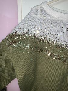 khaki green and white sweater with gold sequins