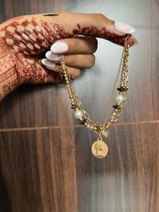 Layered Gold Bracelet With Charm