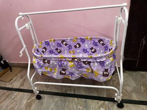 Babyhug, brand new baby cradle with mosquito net