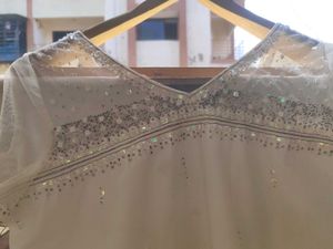 A White Short Kurti With Straight Pent