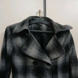 black and grey check mid length coat