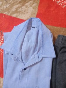 blue shirt with black pant