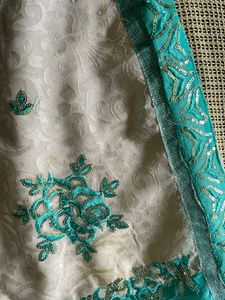 Half Green And White Saree With Stitched Blouse