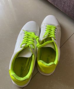 White Sneakers with Neon Green Accents