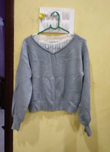 Chic Grey V-Neck Sweater with Delicate Lace Detail