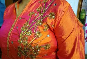 Elegant Orange Embroidered gown