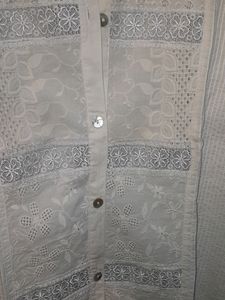 White Colored Shirt With Net Work On Front Sleeves