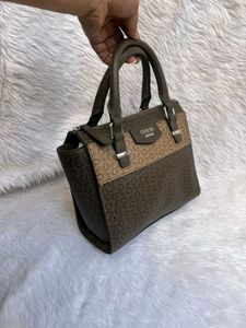 Guess Monogram Sling bag