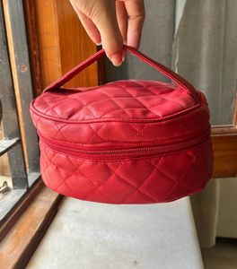 Revlon Makeup Pouch + Free Powder Puffs