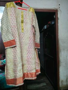 Cream Printed Nice Kurti.