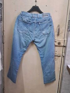 Ripped Blue Denim Jeans