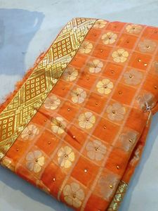Organe Colour Saareee.                                     Fully Laced Saaree Blouse Attach Within.                            No coins/No Swap