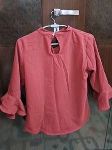Ruffled Top with Unique Neckline