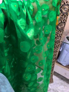 Green Leaf Saree With Yellow Stones.