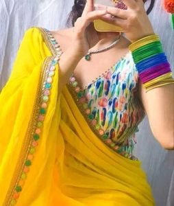Yellow Georgette Saree With printed blouse(new)