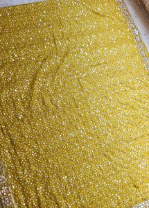 Golden Embellished saree with blouse piece