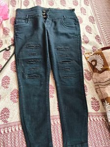Ripped High-Waisted Jeans