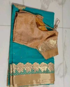 Teal Saree with Gold Embellishments