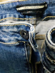 Distressed Denim Jeans