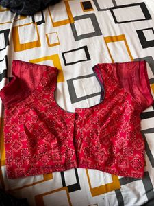 Elegant Printed Saree with reddish pink blouse