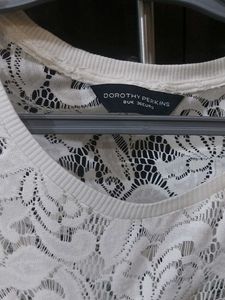 White Coloured Laced Top.