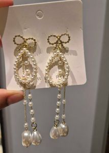Bow N Pearls Long Korean Earrings