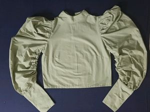 Bell hands green top