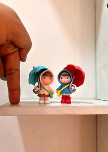 Cute cartoon little girl holding an umbrella