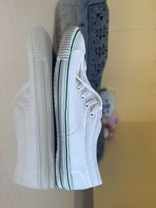 White bata shoes
