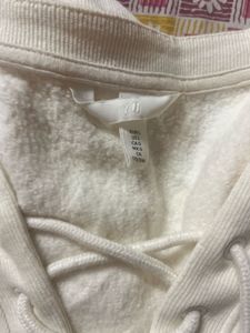 H&amp;MCream Lace-Up Pullover Sweatshirt