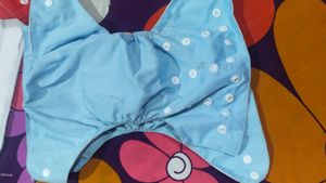 Hand Wash Reusable Diapers For Babies 4 pieces With 4 Pads2 Red 2 Sky Blue Colour