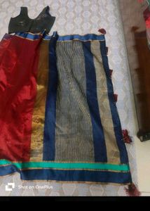 Maroon Saree With Sleevless Blouse