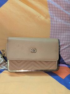 Elegant Nude Clutch with Gold Accents