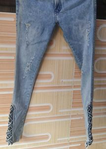 Distressed Denim Jeans